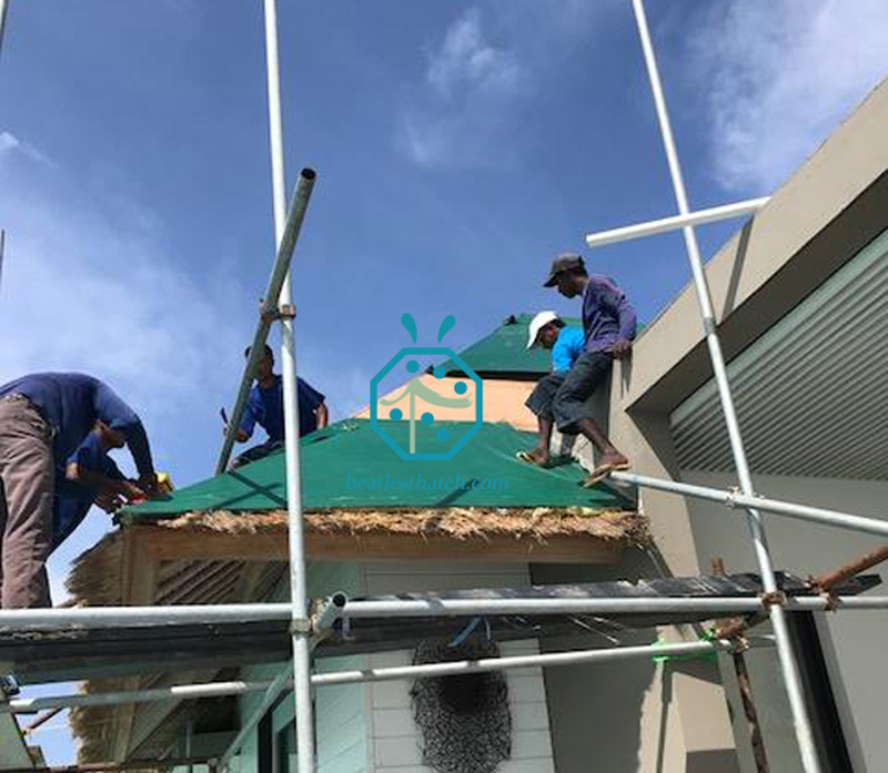 Thatched roof repairs and install waterproof fabric