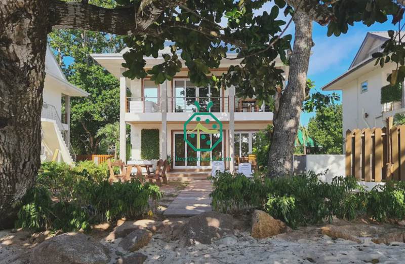 Seychelles bungalow house to use aluminum thatched roofing and plastic bamboo woven ceiling panel