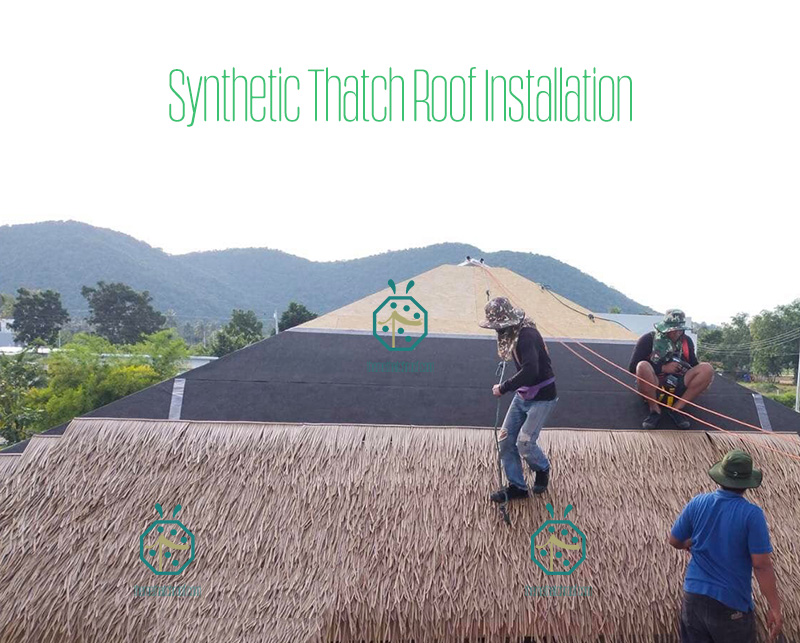 Synthetic thatch roof installation for beach inn cottage Synthetic thatch roof installation for beach inn cottage