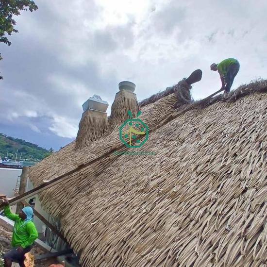 Synthetic palm thatch sunshade roof